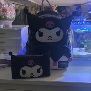 Lounge fly Kuromi and wallet. Both hardly used, and new.